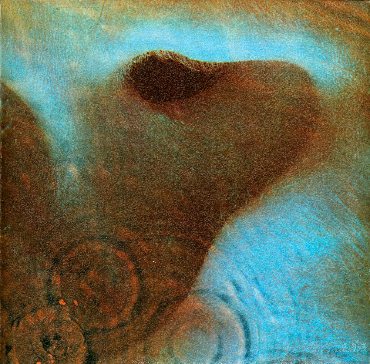 Pink Floyd Meddle album cover, an ear underwater with concentric ripples.